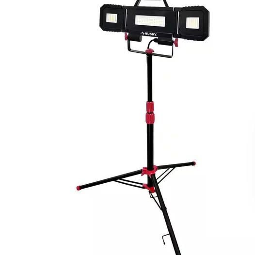 Multi-directional LED tripod work light with LED panels, black frame and red stand
