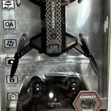Compact drone with HD camera, folded propellers visible in retail packaging