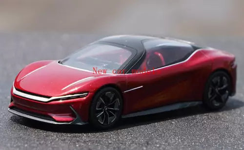 Red diecast concept car model with black wheels, front three-quarter view