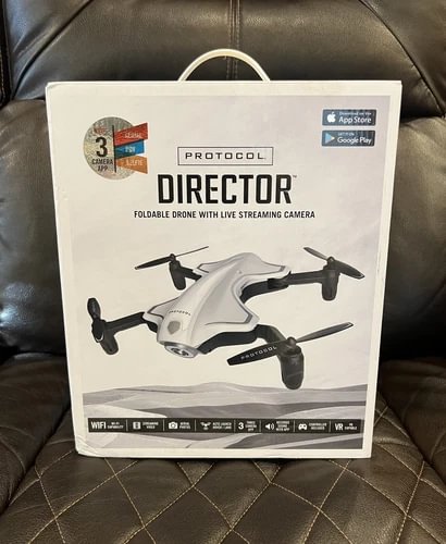 Foldable drone product box with illustrated quadcopter and app store badges