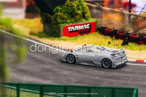 Gray diecast sports car model, front three-quarter view