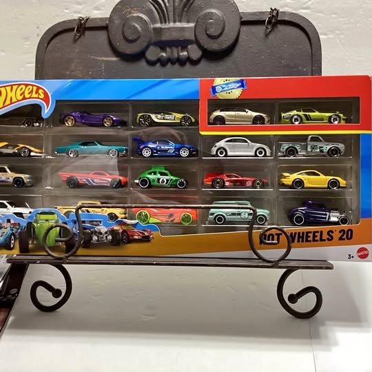 Hot Wheels 20-pack diecast car set in blister display, assorted vehicles