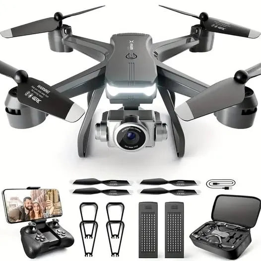 Gray quadcopter drone with front camera and fold-out arms, plus controller and spare prop guards