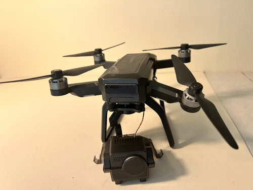 GPS drone with camera gimbal, four propellers and landing gear