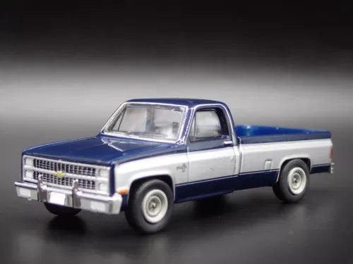 1/64 diecast model pickup truck, blue and white cab with silver grille