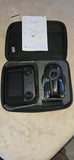 Small drone in zippered carrying case with instruction sheet and prop guards