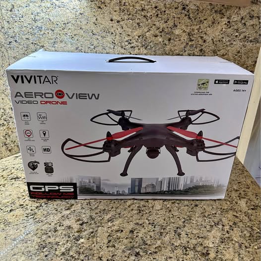 Vivitar AeroView GPS video drone box with illustrated quadcopter and propellers
