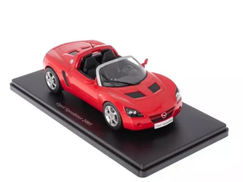 Red diecast sports car model on display base