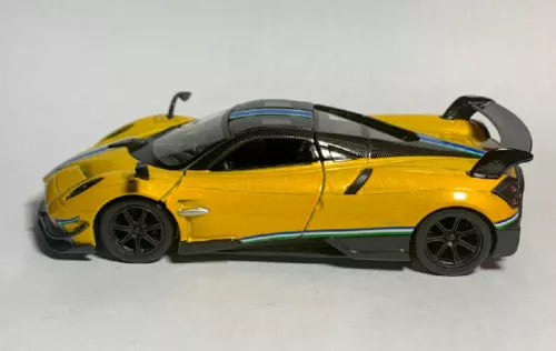 Yellow diecast sports car with black wheels and aerodynamic rear spoiler