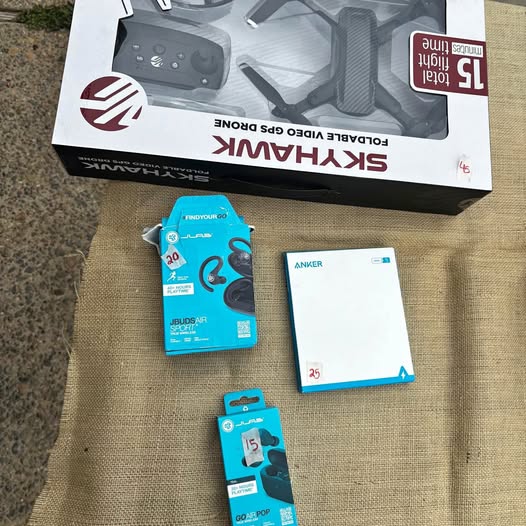 Wireless earbuds and portable charger retail packaging with Anker box