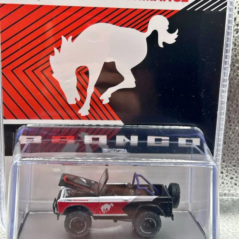 Diecast off-road truck toy in clear blister, white with red accents and black wheels