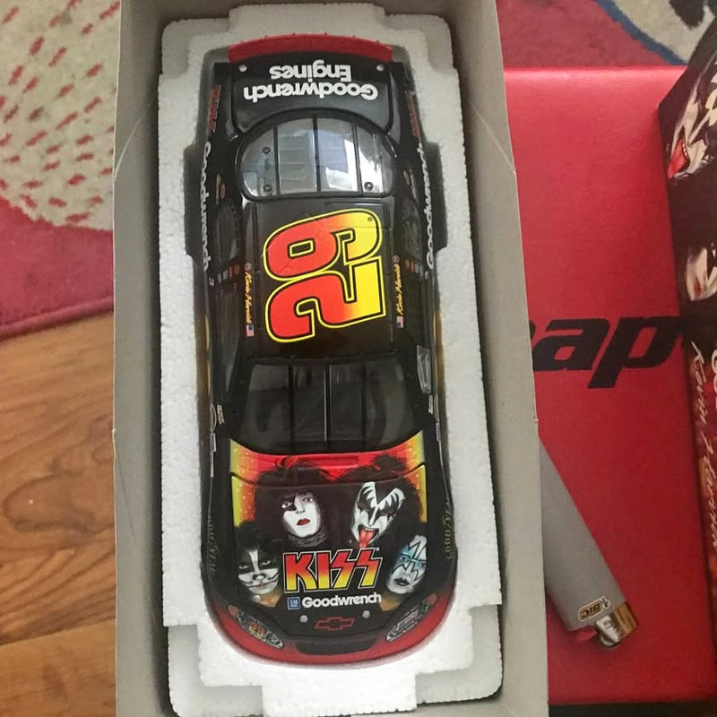Diecast car model, black with KISS and Goodwrench decals and colorful hood logo