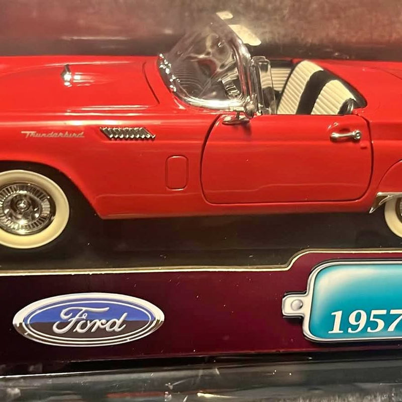Red 1/18 diecast Ford Thunderbird car model, chrome front and side badge