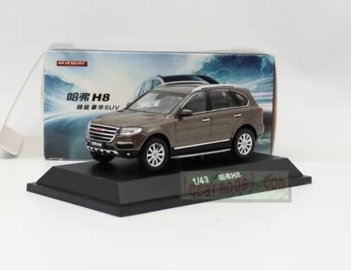 Brown pull-back diecast SUV model on display base, in retail box