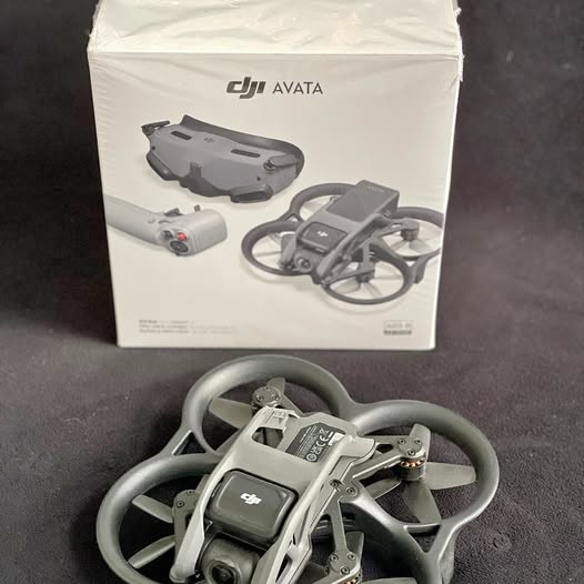FPV drone with gray propellers and motion controller module