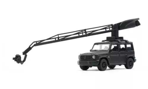 Diecast SUV model with raised arm camera rig, dark gray body and black roof