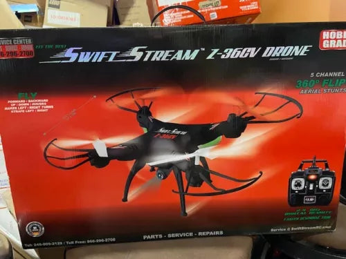 RC quadcopter drone with camera, shown with handheld controller