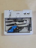 Blue and black mini RC helicopter drone with remote controls in open box