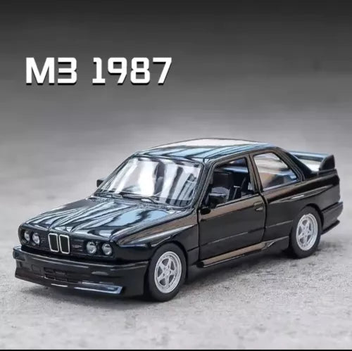 Dark BMW M3 1987 diecast model car, front three-quarter view
