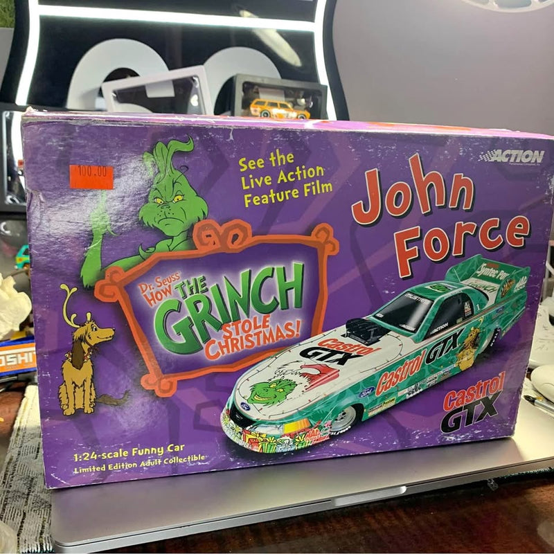 1:24 scale diecast funny car collectible box with green John Force Grinch artwork