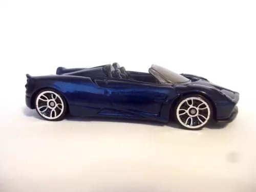 1/64 diecast roadster car, dark blue with black hood and silver wheels