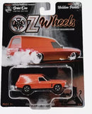 Red diecast Holden HJ Sandman panel van toy in clear blister packaging