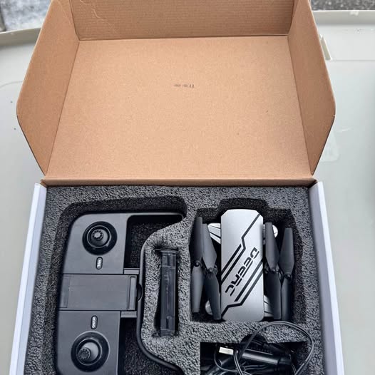 HD camera drone with camera module in protective foam insert