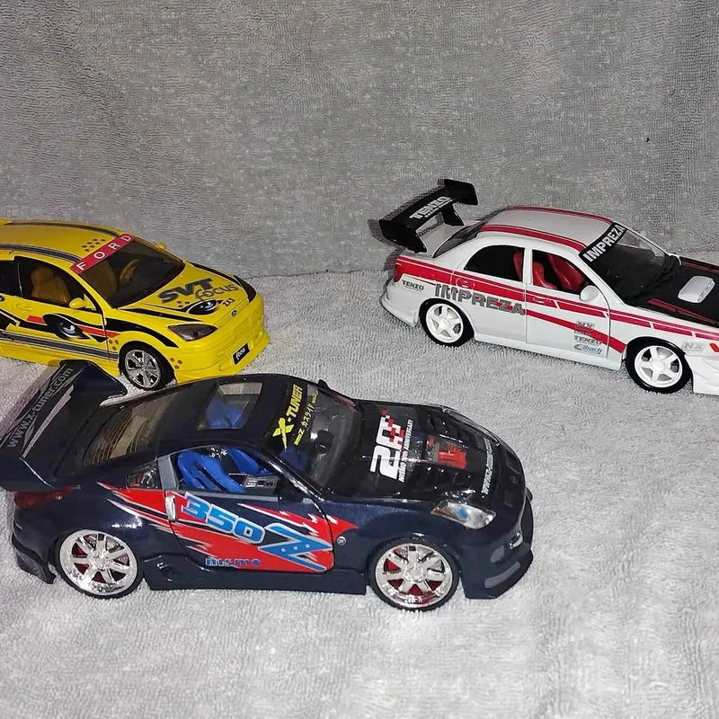 Diecast car set with yellow, white red, and dark blue racing cars