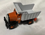 Thomas Friends diecast metal dump truck with gray hopper and orange cab, number 15