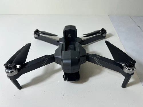 Dark quadcopter drone with 2-axis gimbal, four folded propellers