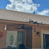 Black quadcopter drone with four propellers, hanging display