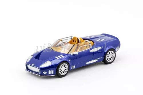 1:64 blue diecast sports car model with yellow interior, front three-quarter view