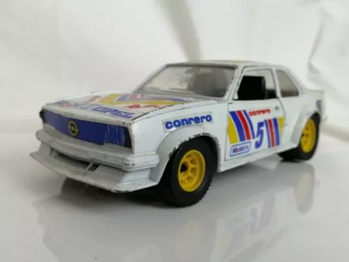 Polistil vintage diecast model car, white rally coupe with blue decals and yellow wheels