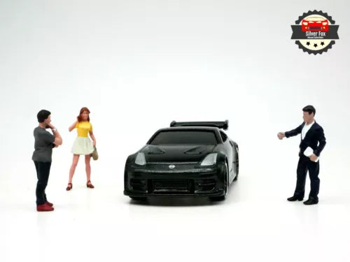 1:64 diecast car with three business figurines