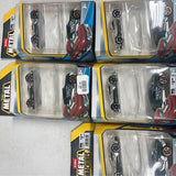Diecast toy cars in clear blister packs, multiple vehicles in assorted colors