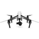 White quadcopter drone with camera gimbal and four motor arms