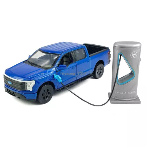 Blue diecast pickup truck model with EV charging stand, front three-quarter view