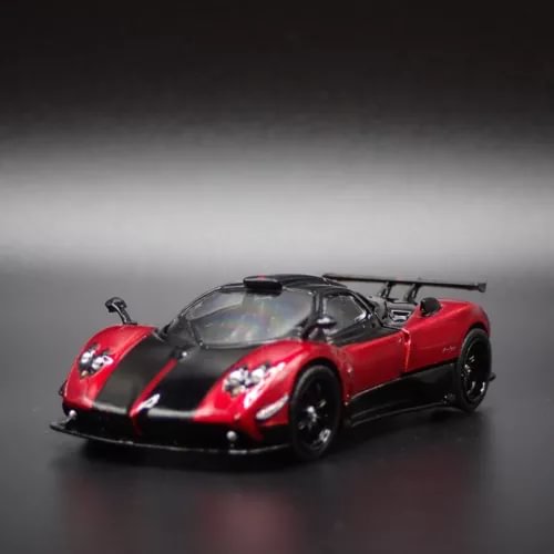 Red and black sports die-cast car model with front headlights and grille detail
