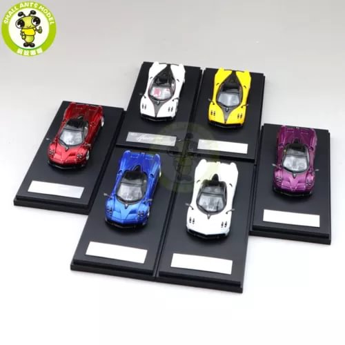 Diecast supercar model cars in red, white, yellow, blue, and purple on bases