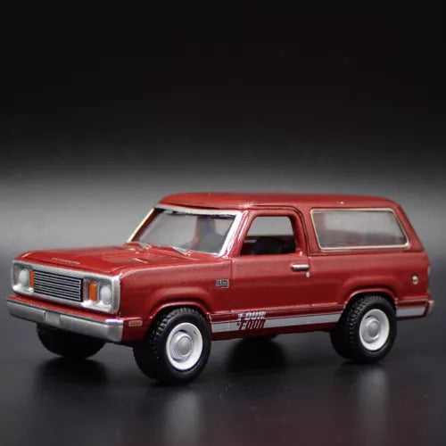 Red 1978 Plymouth Trail Duster SUV diecast model car, front side view, 1/64 scale