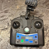 Drone remote control with dual joysticks, screen, and 2.4GHz indicator, dark gray
