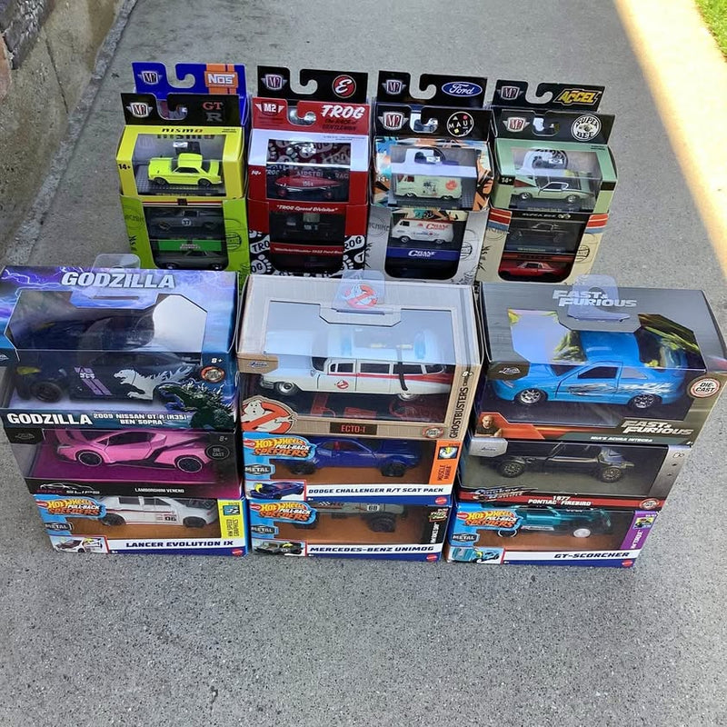 Hot Wheels diecast car 1/32 and 1/64 boxed assortment, multiple vehicle designs.
