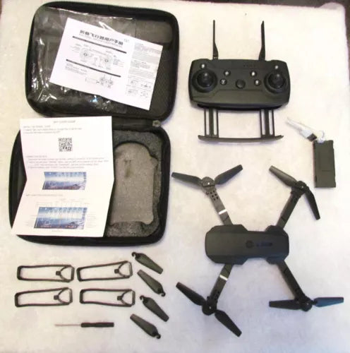 Children’s camera drone with remote controller, propellers, battery, and soft carrying case