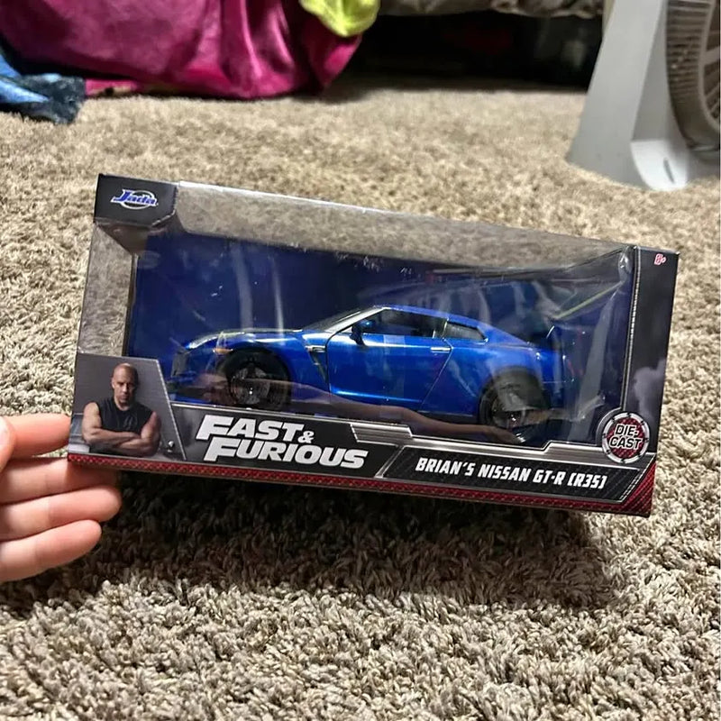 Blue diecast Nissan GT-R R35 sports car in retail box, Fast & Furious themed