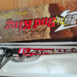 Red and white diecast car with printed graphics and side decals