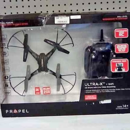 Propel Ultra-X WiFi HD drone in box with four propellers and remote controller
