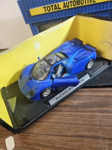 Blue Pagani Zonda C12 1/18 diecast model car on display base