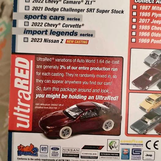 Maroon 1:64 diecast sports car model with black wheels, in Ultra Red blister package