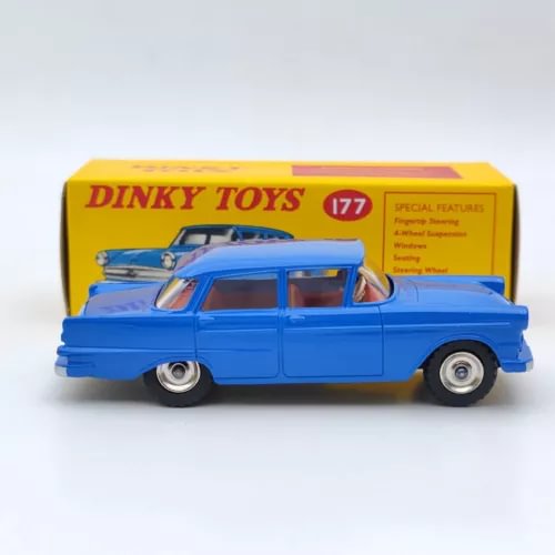 Blue diecast model car with chrome bumper and whitewall-style wheels, 4-door sedan.
