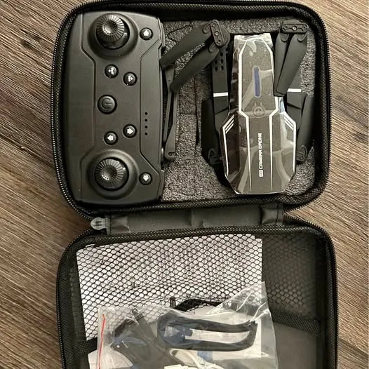 Hardshell drone carrying case with controller and camera drone